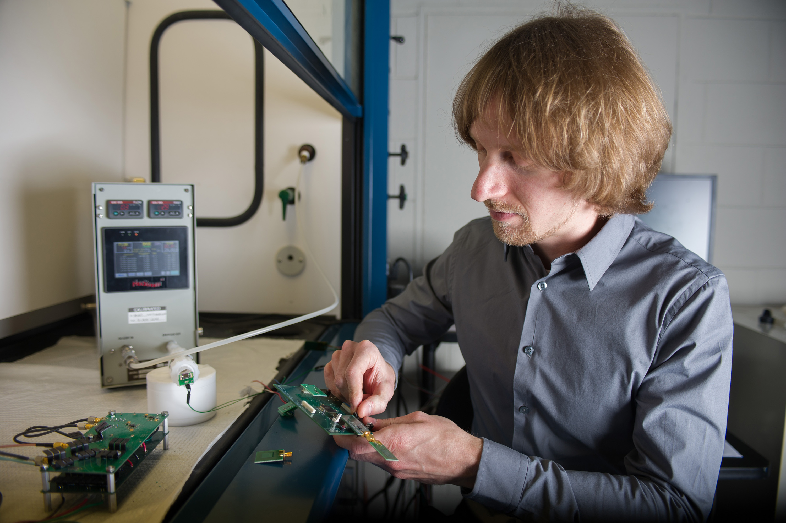 Researcher inspects the RFID 