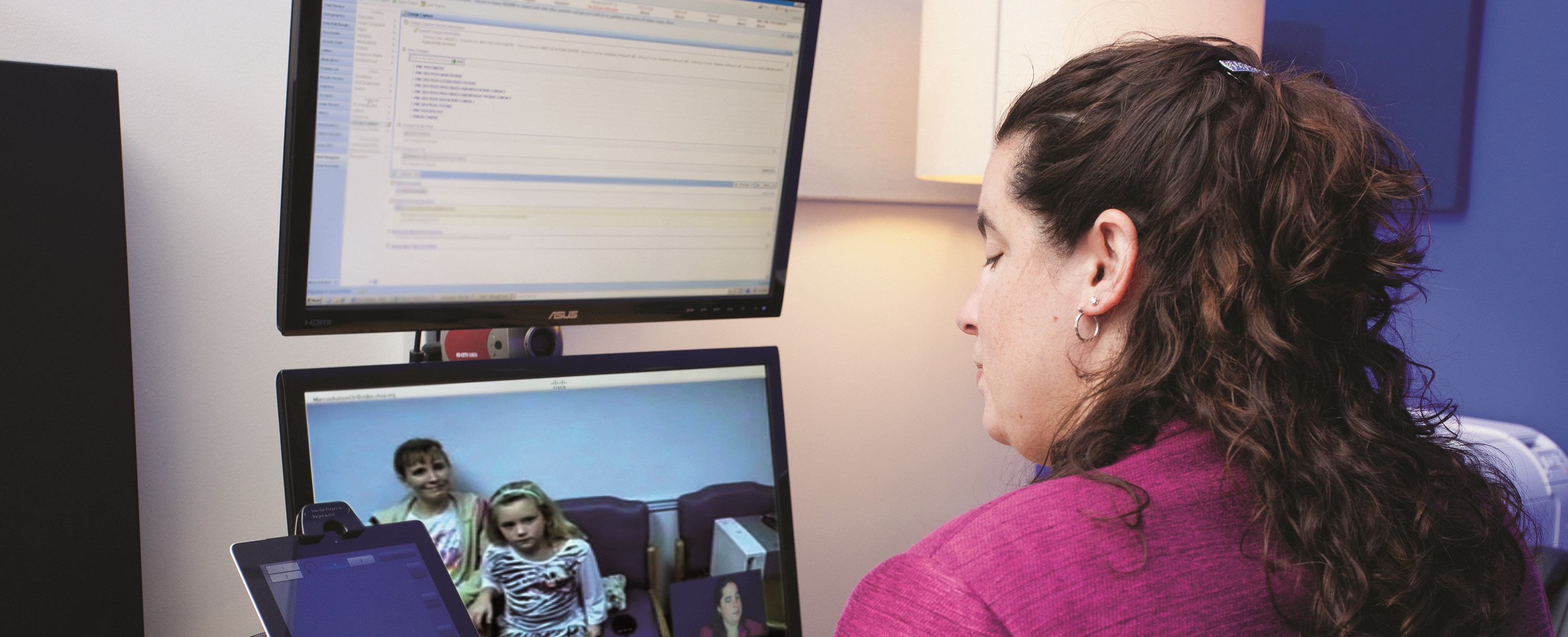 doctor using the telemedicine system at Marcus Autism Center