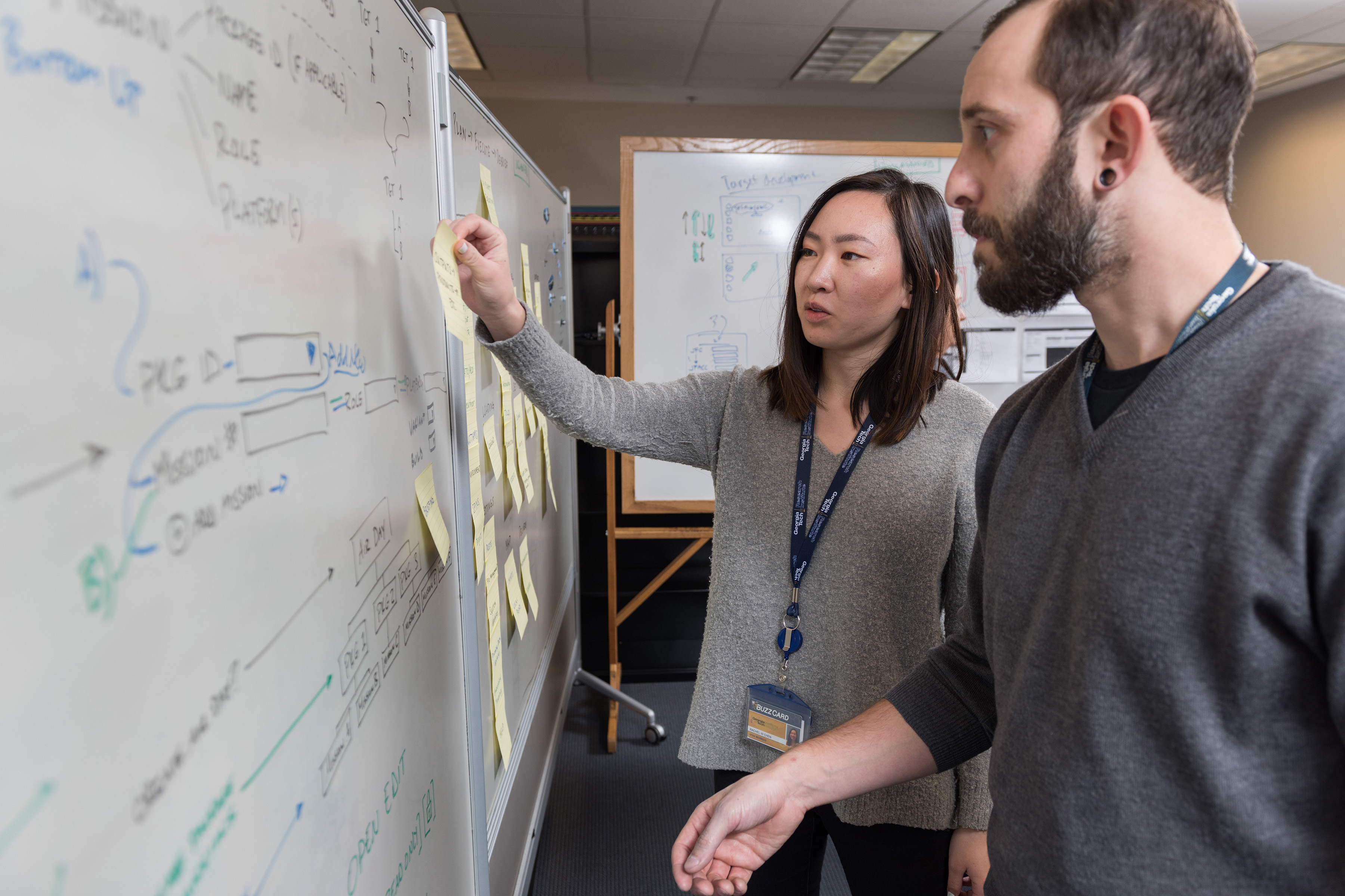 GTRI-Research-Scientist-Andrew-Baranak-and-Georgia-Tech-Graduate-Student-Rachel-Chen-discuss-creating-user-interface-workflows-for-the-mission-planning-task