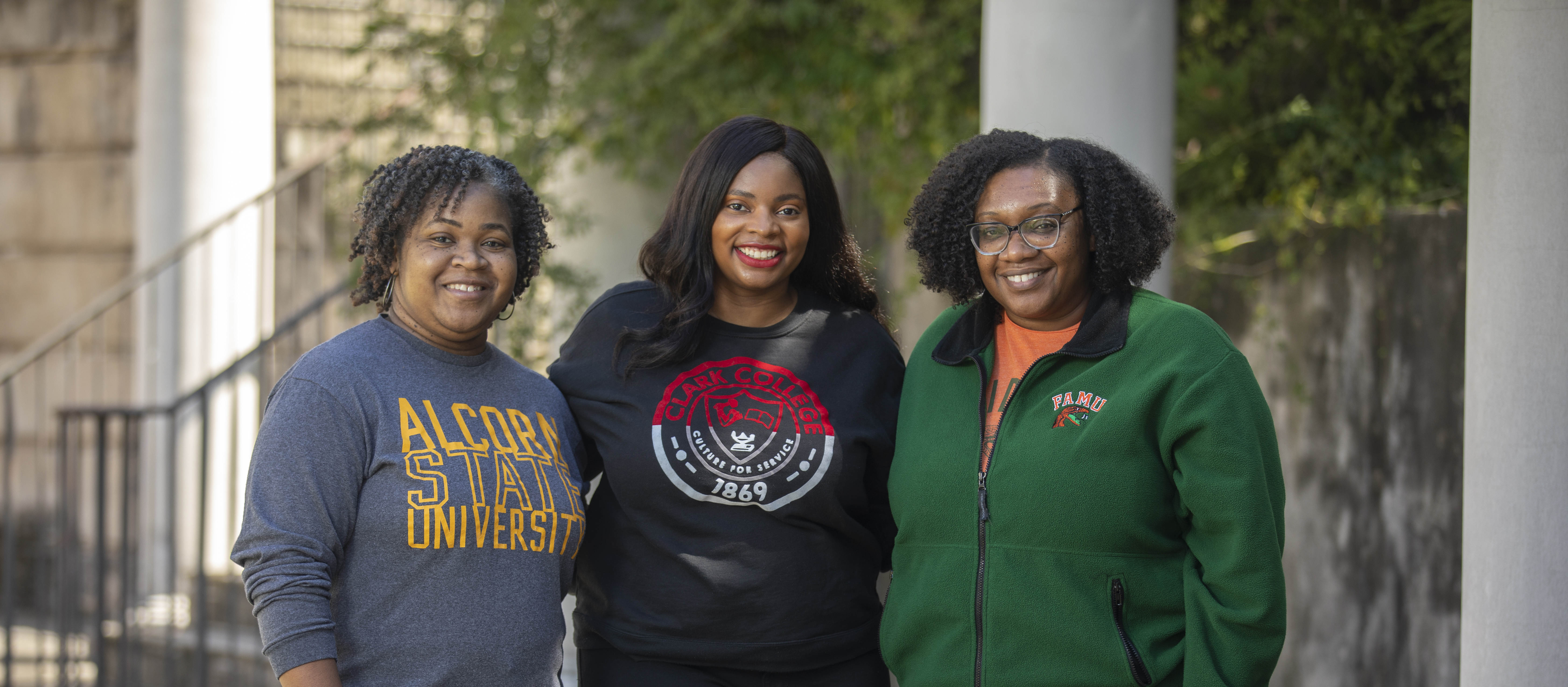 GTRI's Yorlanda Pryor, Brittney Odoi, and Tanya Wooten wear clothing representing their HBCU alma maters. (Photo credit: Christopher Moore)