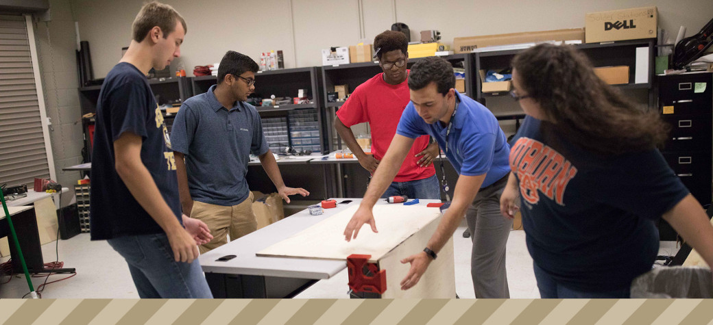 GTRI interns in a lab.