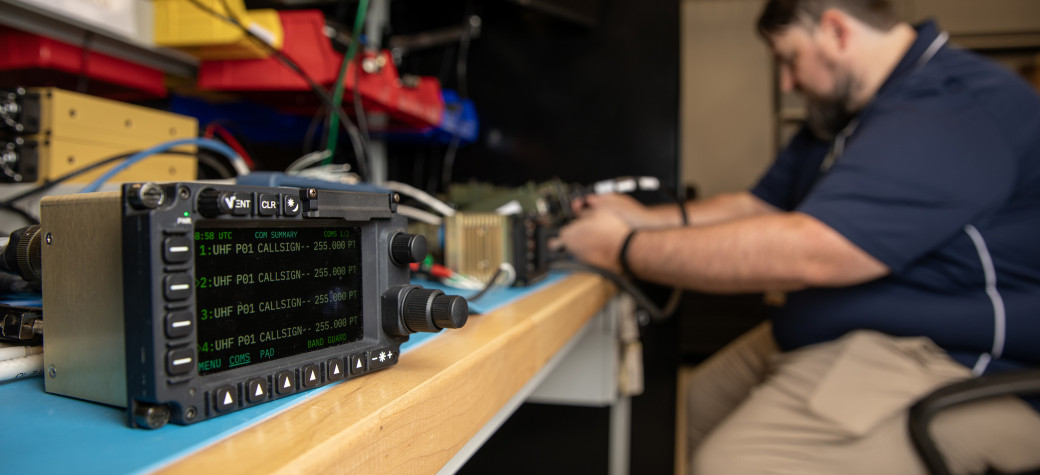 Researcher works on the GTRI-developed pilot vehicle interface.